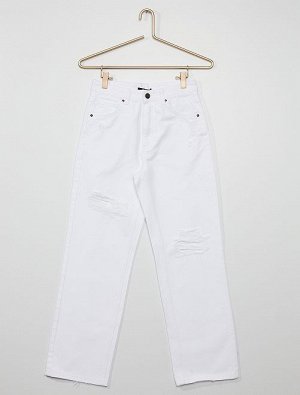 Белые джинсы с потертостями