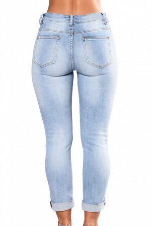 Светло-голубые джинсы скинни с разрезами и цветочной вышивкой