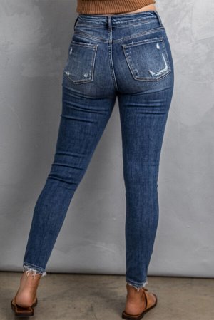 Синие рваные облегающие  джинсы с завышенной талией