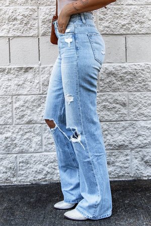 Голубые потертые джинсы-клеш с высокой талией и дырками на коленях