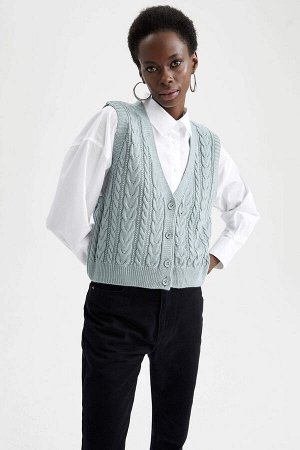 Вязаный свитер оверсайз с v-образным вырезом и узором