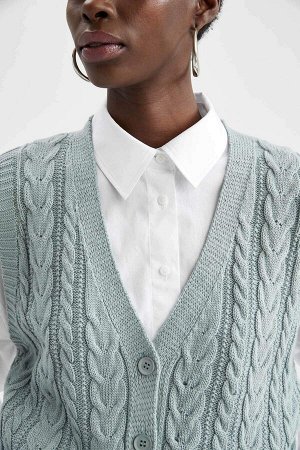 Вязаный свитер оверсайз с v-образным вырезом и узором