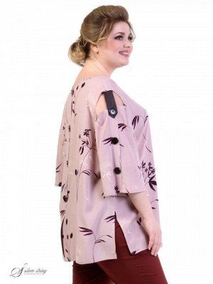 Блузка Оригинальная блуза свободного силуэта из натуральной ткани с растительным рисунком. Горловина округлой формы, расширенная к плечам. Рукав втачной, длиной «за локоть», с имитацией застежки на пу