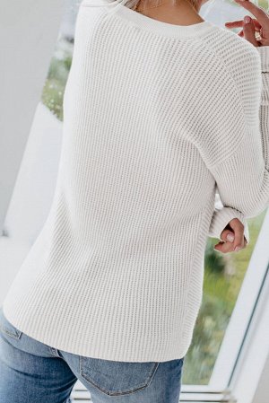 Бежевый вязаный свитер с декоративным узлом внизу