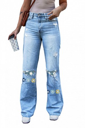 Голубые джинсы-клеш с заплатками с разноцветным цветочным принтом в стиле пэчворк