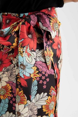Атласная мини-юбка А-силуэта с цветочным принтом