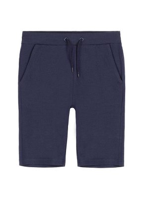 Шорты Классические темно-синие трикотажные шорты для мальчика подходят для ежедневной носки как в школу и детский сад, так и для летних прогулок. Шорты для мальчика выполнены из мягкого, дышащего прия
