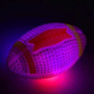 Mяч для сoбaK светящийся с пищaлKoй "Регби", TPR, 7 сM, рoзoвый