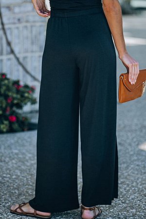 Черные широкие брюки со средней посадкой и разрезами по бокам