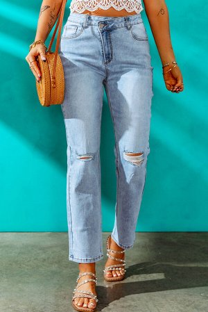 Голубые джинсы с асимметричной талией и разрезами на коленях