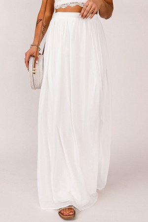 Белая длинная юбка с высокой талией и разрезом