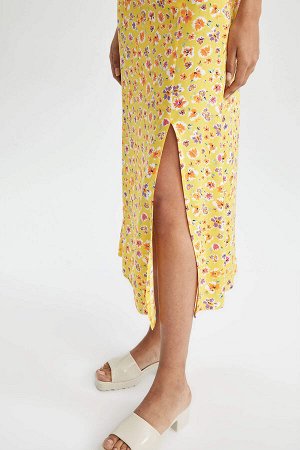 Юбка миди А-силуэта с цветочным принтом и стандартной талией с разрезом