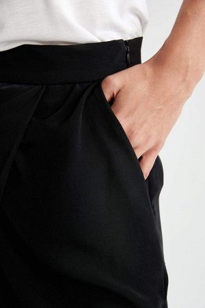 Широкие брюки-кюлоты с эластичной резинкой на талии