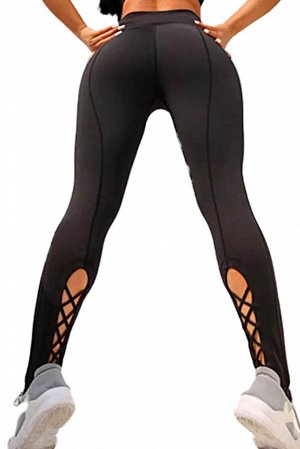 Черные леггинсы для фитнеса и йоги с перекрестными разрезами на штанинах