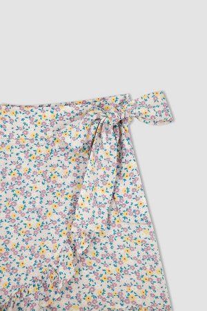 Короткая мини-юбка с цветочным узором