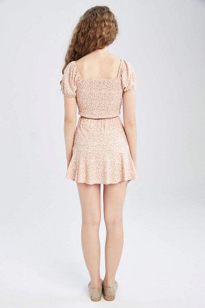 Классная короткая юбка с цветочным принтом