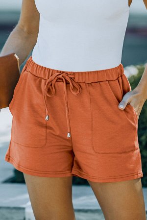 Оранжевые шорты с эластичной резинкой на талии и карманами