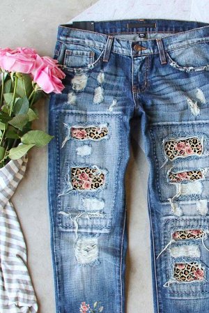 Голубые джинсы с заплатками с цветочным и леопардовым принтом