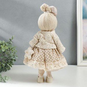 Кукла интерьерная "Малышка в бежевом платье в горох, с цветочком" 39х12,5х17 см