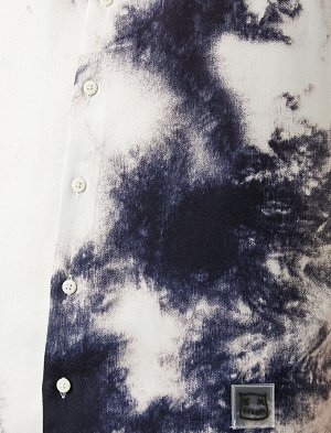 Рубашка Материал: %100 Вискоз Параметры модели: рост: 188 cm, объем груди: 98, объем талии: 82, объем бедер: 95 Надет размер: M