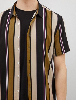 Рубашка Материал: %100 Вискоз Параметры модели: рост: 188 cm, объем груди: 94, объем талии: 77, объем бедер: 0 Надет размер: M