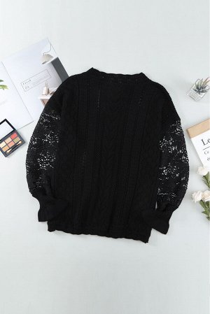 Черный вязаный свитер с перфорацией и кружевным вставками на рукавах