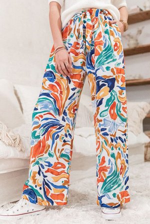 Разноцветные широкие штаны с высокой талией и красочным принтом