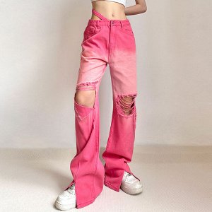 Женские джинсы клеш с разрезами по низу, дырки и потертости на коленях, цвет розовый