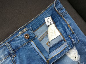 Женские удлиненные джинсовые шорты с порезами, цвет синий