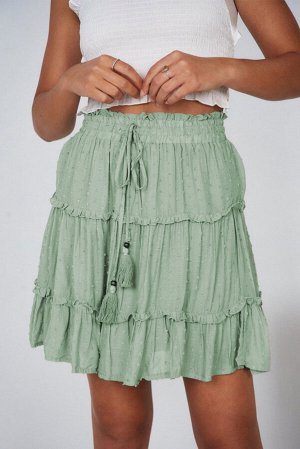 Зеленая многоярусная мини-юбка в горошек с присборенной талией и оборками