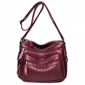 Женская мягкая сумка почтальонка из эко кожи, с широким ремешком и накладным карманом, цвет винный