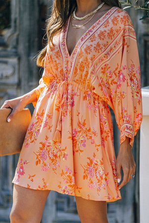 Оранжевое платье-кимоно с кисточками и цветочным принтом