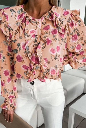 Розовая блузка с цветочным принтом длинным рукавом и рюшами