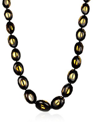 Роскошные нарядные бусы из цельного янтаря с алмазной огранкой «Оливка двухцветная»