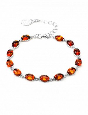 Браслет, украшенный натуральным янтарём коньячного цвета «Кадриль»