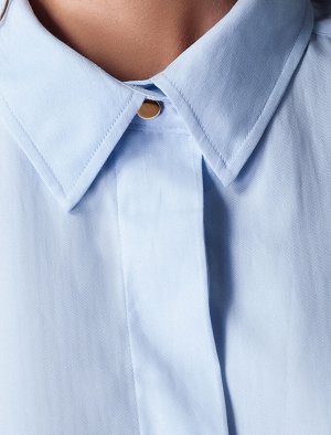 Удлиненная блузка с высокими разрезами