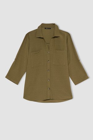 Туника-рубашка с карманами и эполетами классического кроя