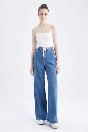 Широкие джинсовые брюки с высокой талией и кружевом