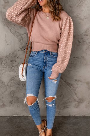 Розовый вязаный свитер с объемными текстурированными рукавами