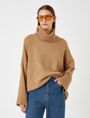 Вязаный свитер с высоким воротником