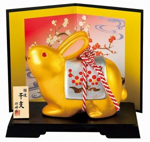 MATSUMOTO - желтый кролик с повязкой на подставке