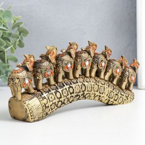 Сувенир полистоун "Семь слонов на бивне с цветами" бронза 21х4х9,8 см