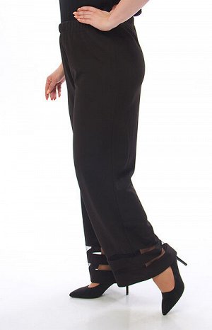 1183 брюки Изумительные женские брюки!. Брюки выполнены из черной плотной трикотажной ткани. Низ брюк декорирован вставками из черной сетки. .Брюки с удобной посадкой, комфортным кроем и широким поясо