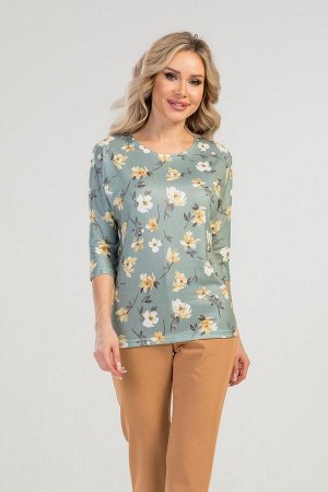 Комплект Комплект блуза и брюки. Блуза из трикотажного полотна. Расцветка цветы на оливковом. Круглый вырез горловины. Рукава 43 см от шейной точки. Без застёжки. ДИ в 42-44 р 64 см, 46-48 р  65 см, 5