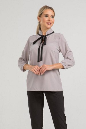 Блуза Изящная блуза прямого силуэта из эластичной блузочной ткани. Расцветка кофейный. Воротник-стойка с завязкой. Втачной рукав собран на манжету длинна 47 см. Низ ровный, без разрезов. Блуза добавит