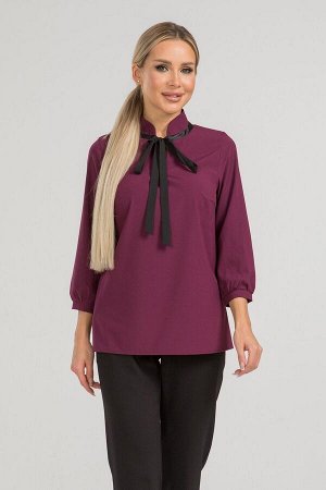 Блуза Изящная блуза прямого силуэта из эластичной блузочной ткани. Расцветка марсала. Воротник-стойка декорирован рюшей и завязкой. Втачной рукав собран на манжету длинна 47 см. Низ ровный, без разрез