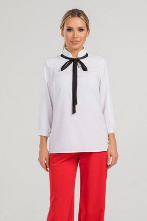 Блуза Изящная блуза прямого силуэта из эластичной блузочной ткани. Расцветка белый. Воротник-стойка декорирован рюшей и завязкой. Втачной рукав собран на манжету длинна 47 см. Низ ровный, без разрезов