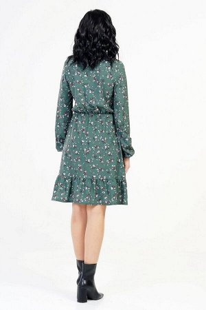 Платье Элегантное воздушное платье приталенного силуэта. Выполнено из легкой эластичной плательной ткани. Расцветка зелёный с цветочным принтом. Втачные длинные рукава 63 см. Платье собрано на резинку