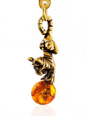 Amberholl / Брелок «Тигрёнок с мячиком», украшенный натуральным янтарём коньячного цвета