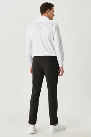 Черные брюки узкого кроя с завязками на талии и боковыми карманами